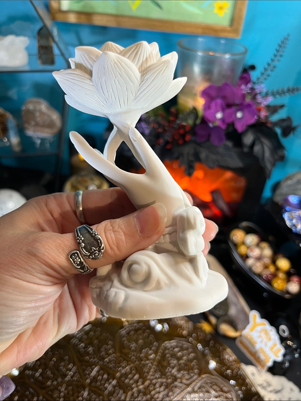 Lotus and hand sphere holder